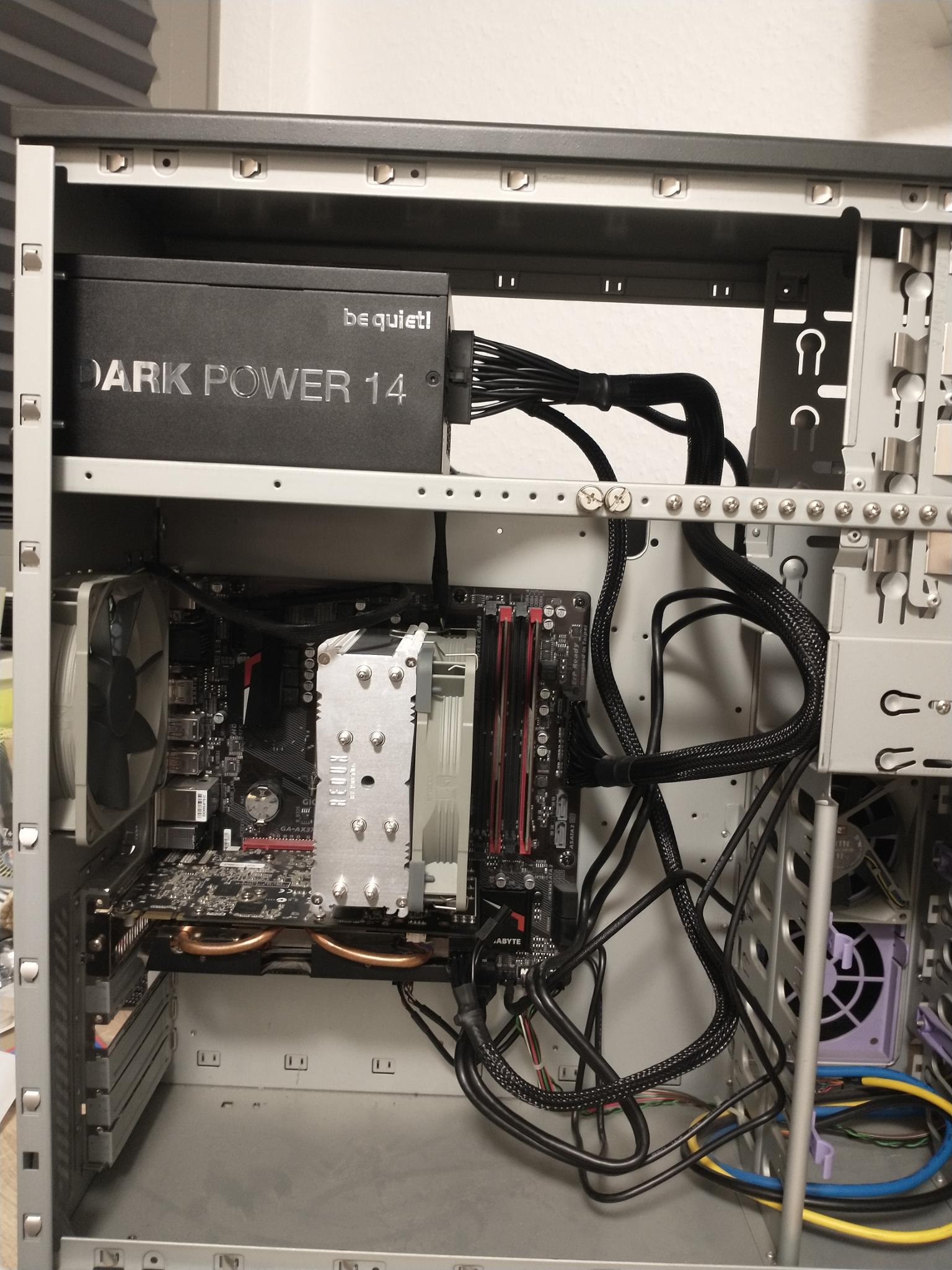 Mounting a power supply in our case using three screw plates.